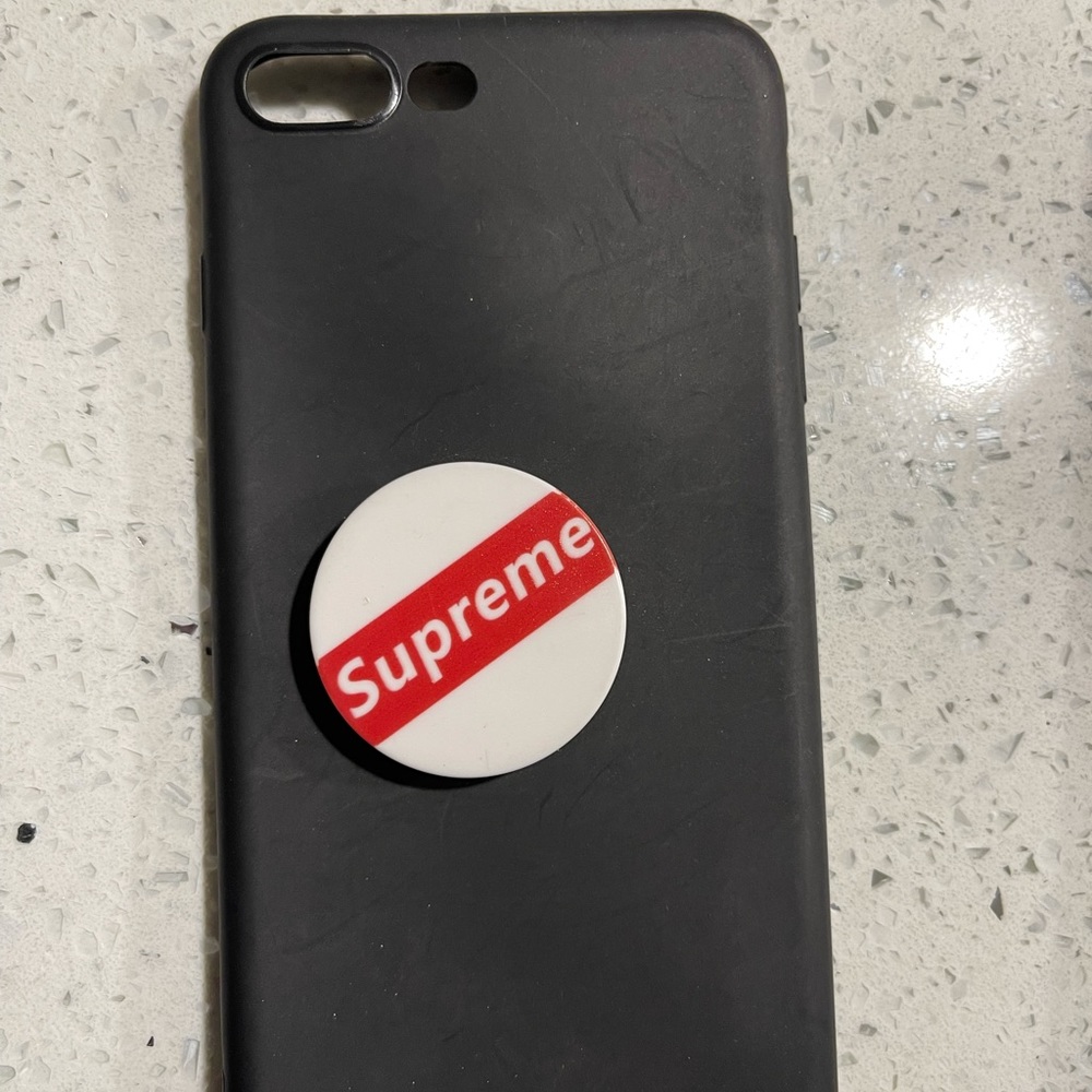 Black 7Plus iPhone case with Supreme pop socket